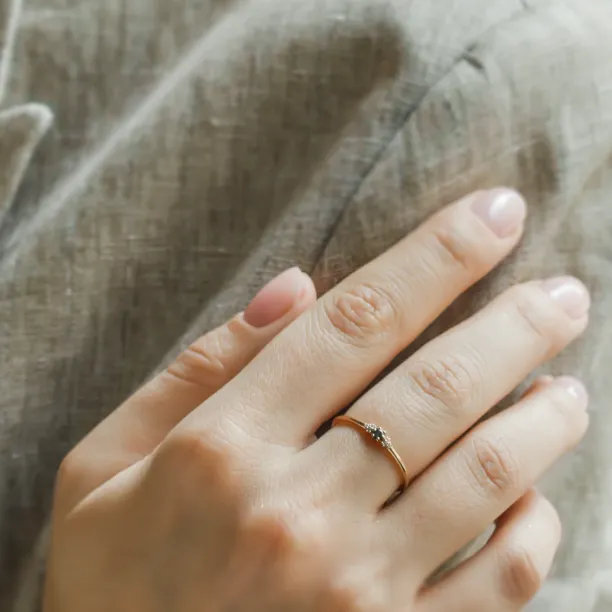 SABINE sapphire and diamond ring worn on the hand