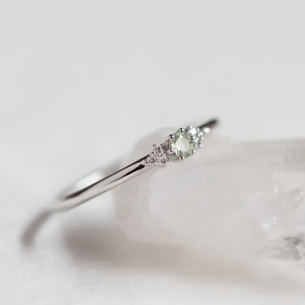 Close-up of the SABINE ring setting with sapphire and diamonds