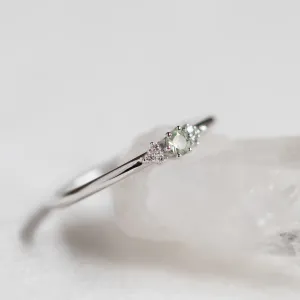 Close-up of the SABINE ring setting with sapphire and diamonds
