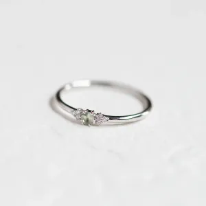 SABINE minimalist sapphire and diamond ring in an angled view