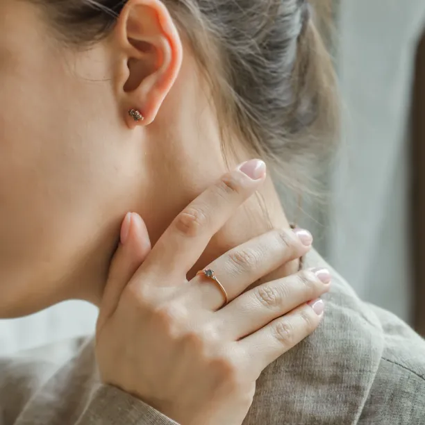 FRANCO diamond ring worn on the hand in a close-up view