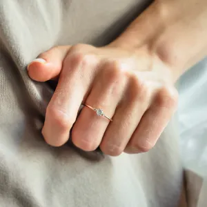 FRANCO salt-and-pepper and classic diamond ring worn on a finger