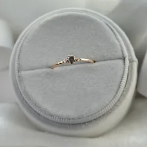 FRANCO gold ring with salt and pepper and classic diamonds, shown from an angled view
