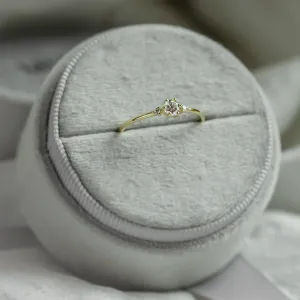 ALICIA gold engagement ring with three diamonds, angled view