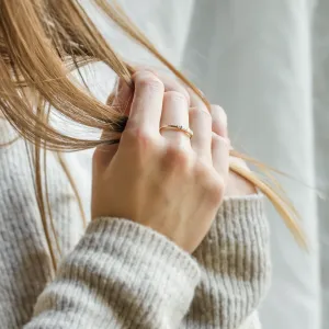 LUMI gold moissanite ring worn on the hand