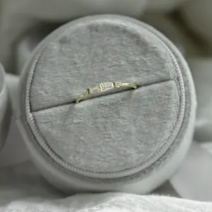 LUMI moissanite ring shown from above, highlighting its gemstone arrangement