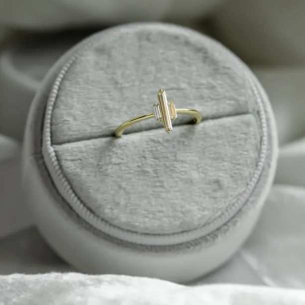 THEA engagement ring with three baguette moissanites, angled view