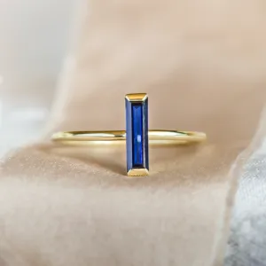 Gold ring with blue lab grown sapphire AZUL