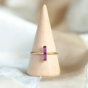 NYX gold ring with a baguette amethyst shown in full