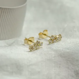 Angled view of diamond cluster earrings ELIN showing the posts