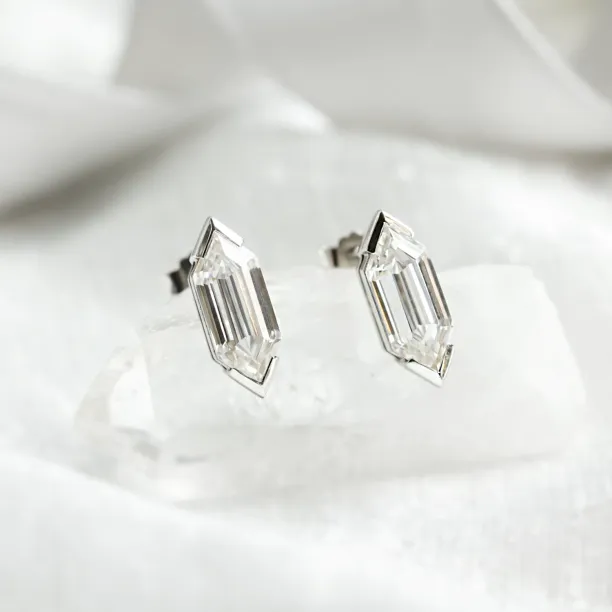 Close-up of SERENA geometric earrings with hexagonal moissanites