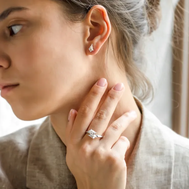 DEVON moissanite ring and earring worn on a hand and ear