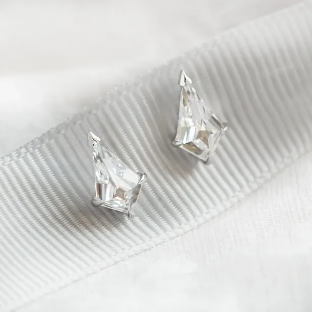 Pair of DEVON kite moissanite earrings in close-up