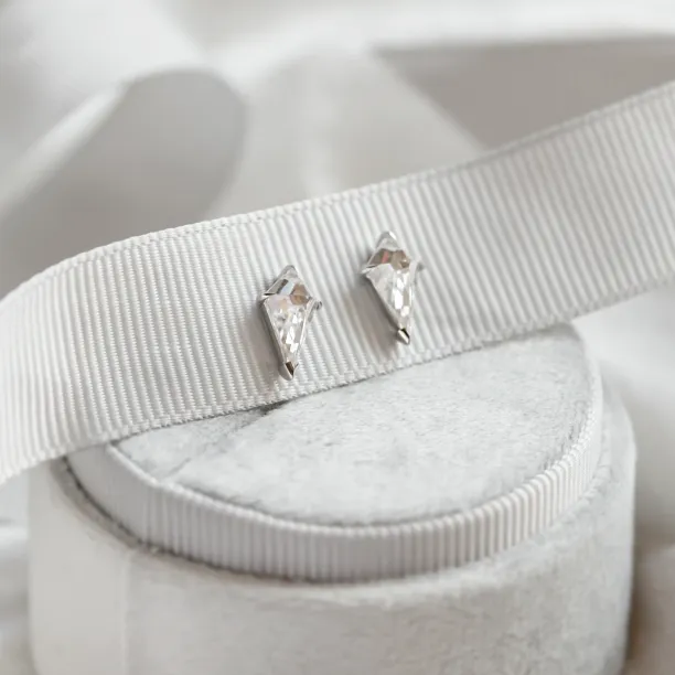 Angled view of the gold kite moissanite earrings DANE