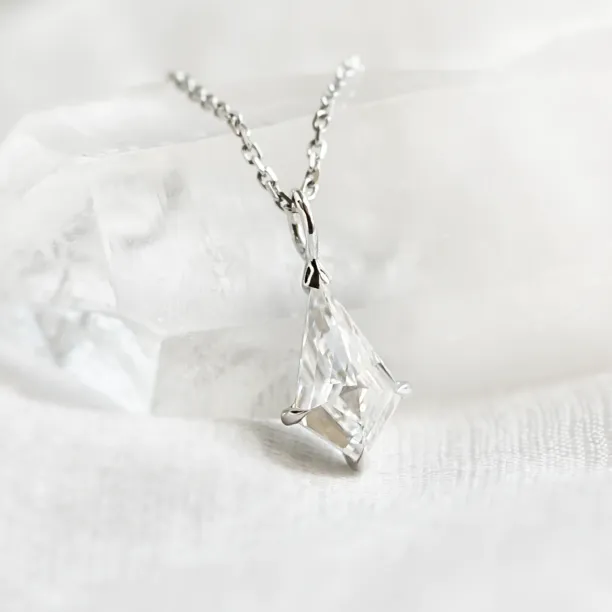Gold kite-shaped moissanite pendant DIONA on a chain