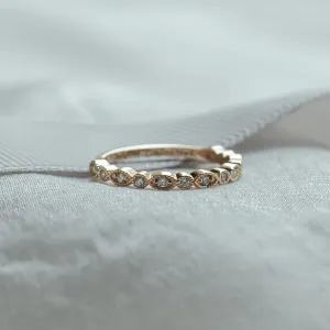 Angled view of the RIGA vintage eternity ring with lab-grown diamonds