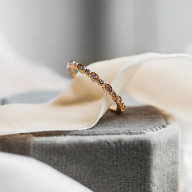 Angled view of the RIGA vintage eternity ring with lab-grown diamonds