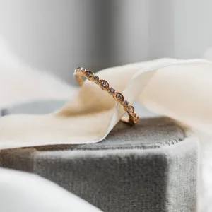 Angled view of the RIGA vintage eternity ring with lab-grown diamonds