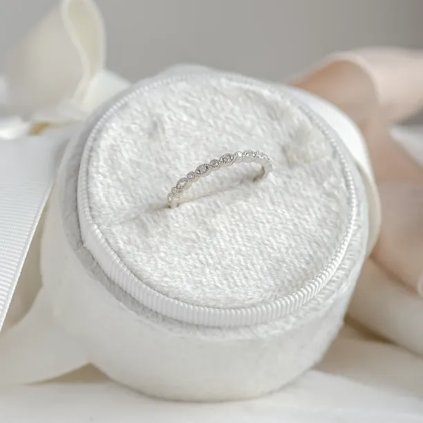 Angled close-up of RIGA vintage eternity ring with lab-grown diamonds