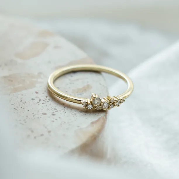 Angled view of the gold STERN ring with lab created diamonds