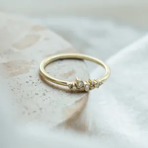 Angled view of the gold STERN ring with lab created diamonds