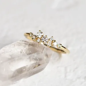 Angled view of the 14K yellow gold CLORÉ diamond cluster ring