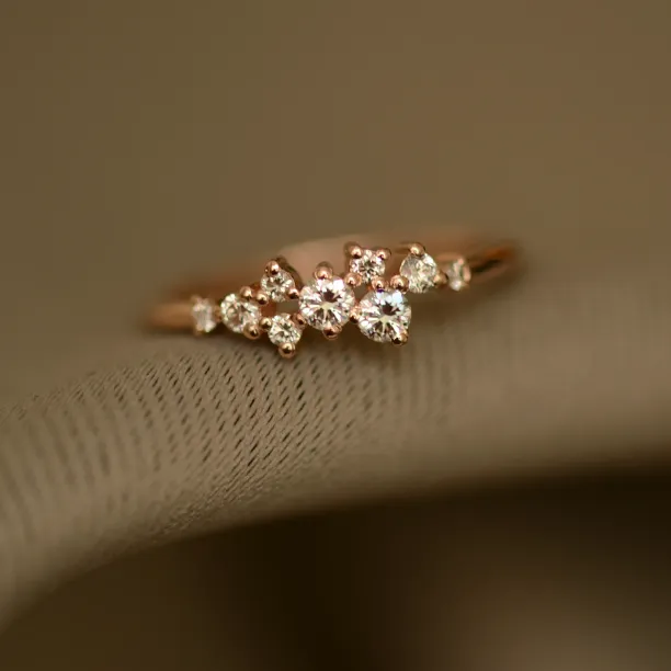 Close-up of the CLORÉ cluster ring showing its diamond arrangement