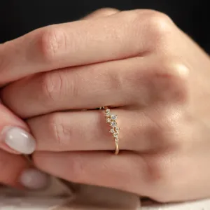 CLORÉ gold cluster ring with diamonds worn on the hand