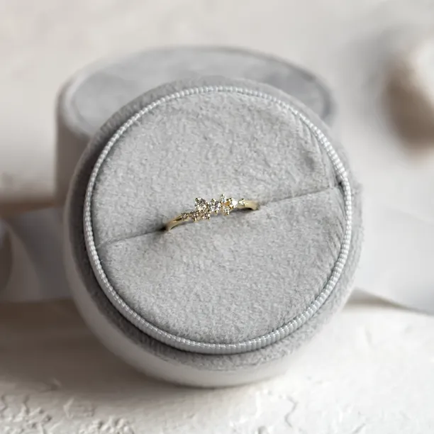 Angled view of CLORÉ gold cluster ring with natural or lab-created diamonds