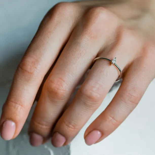 ANTOINE engagement ring with a marquise lab-created diamond worn on the hand