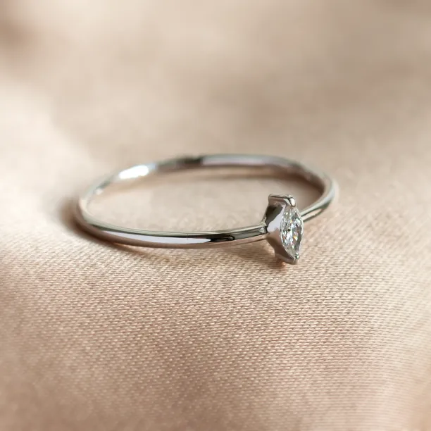 Angled view of the ANTOINE engagement ring with a marquise lab-created diamond