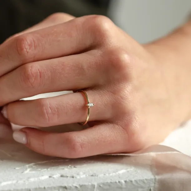 ANTOINE engagement ring with a marquise lab-created diamond worn on the hand