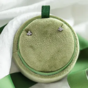 Pair of gold diamond cluster earrings shown separately