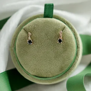 SEAN gold stud earrings with black diamonds displayed as a pair