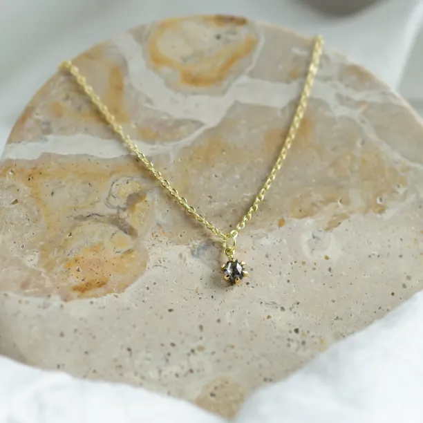CADIE gold pendant with a salt and pepper diamond on a chain