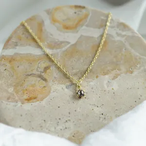 CADIE gold pendant with a salt and pepper diamond on a chain