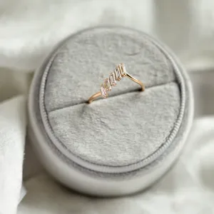 Angled view of the FRANCES gold ring with five baguette moissanites