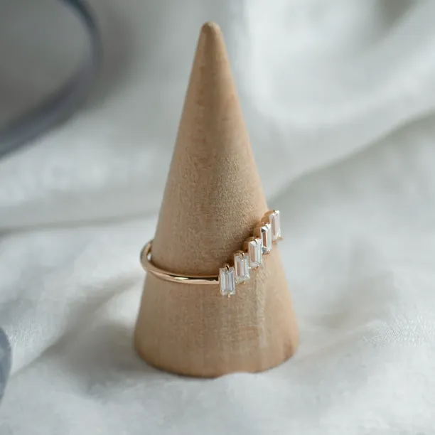 FRANCES gold ring with five baguette moissanites displayed at an angle