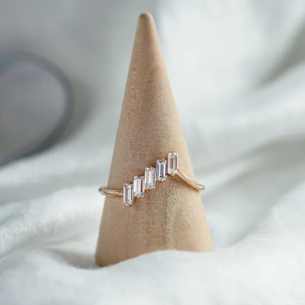 FRANCES unusual gold ring with five baguette moissanites in an angled view