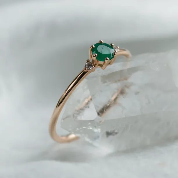 Engagement ring with emerald and side diamonds AVA Image