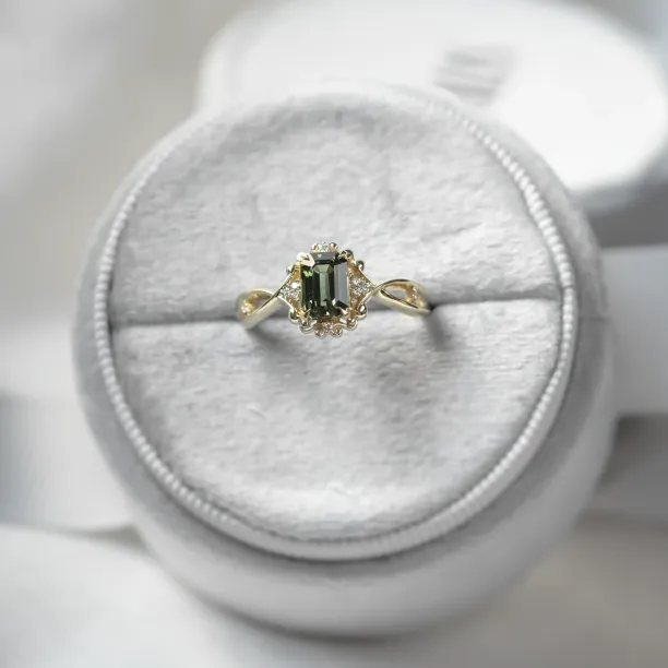 BAROQUE vintage gold ring with green sapphire and diamonds, viewed from above