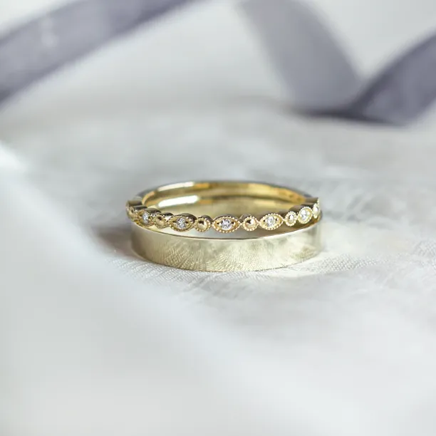 HONEY wedding rings with a diamond eternity band in close-up