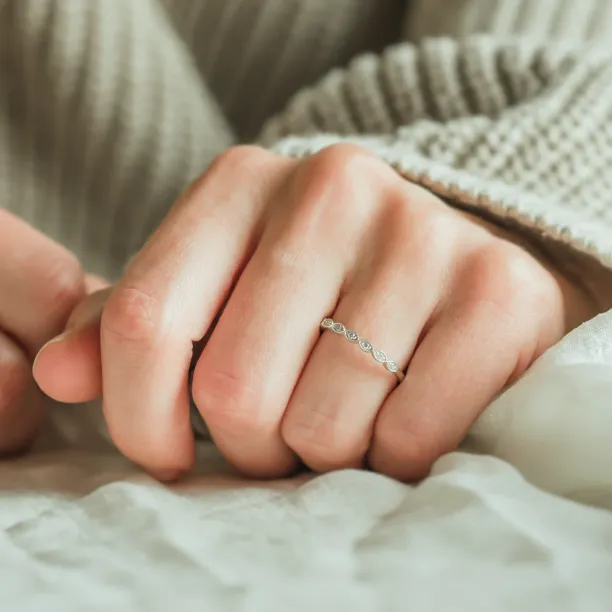 DARLING diamond wedding ring worn on a hand