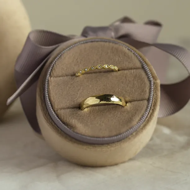 DARLING diamond wedding bands displayed together in a close-up view