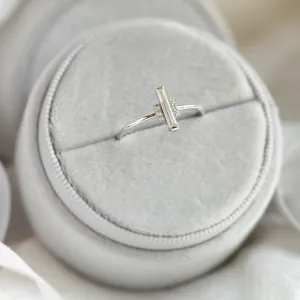 Angled close-up of the ETHEL ring and central baguette moissanite