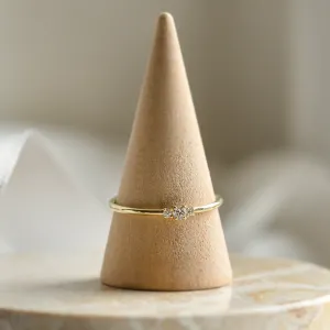 HANNAH minimalist diamond ring displayed on a ring cone