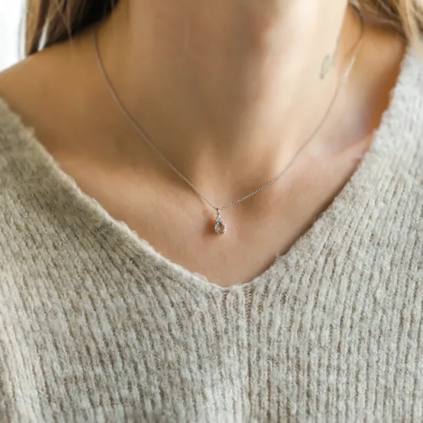 FEMINA gold necklace with morganite pendant worn on the neck
