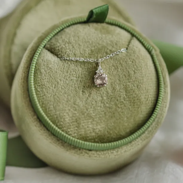 FEMINA gold necklace with morganite pendant in a full display view