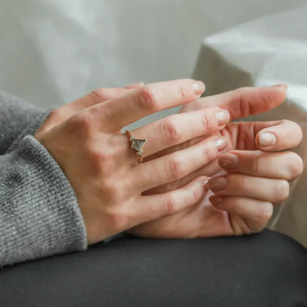 KAREN engagement ring with a kite-shaped salt and pepper diamond worn on the finger