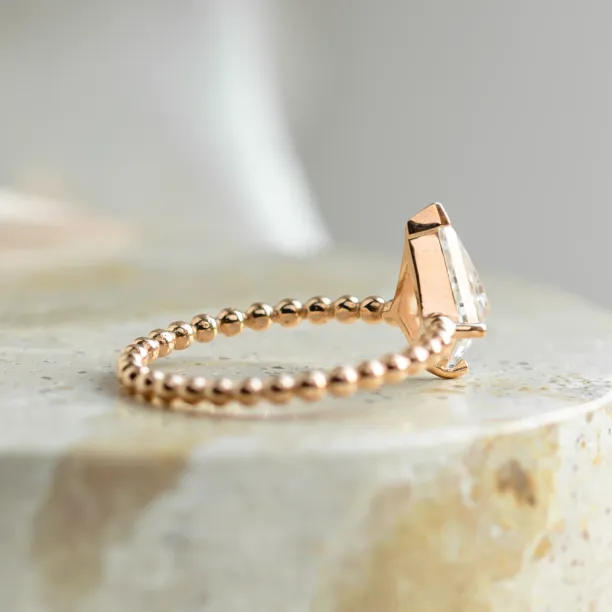 Engagement ring with beaded ball setting and kite moissanite BREEZE Image